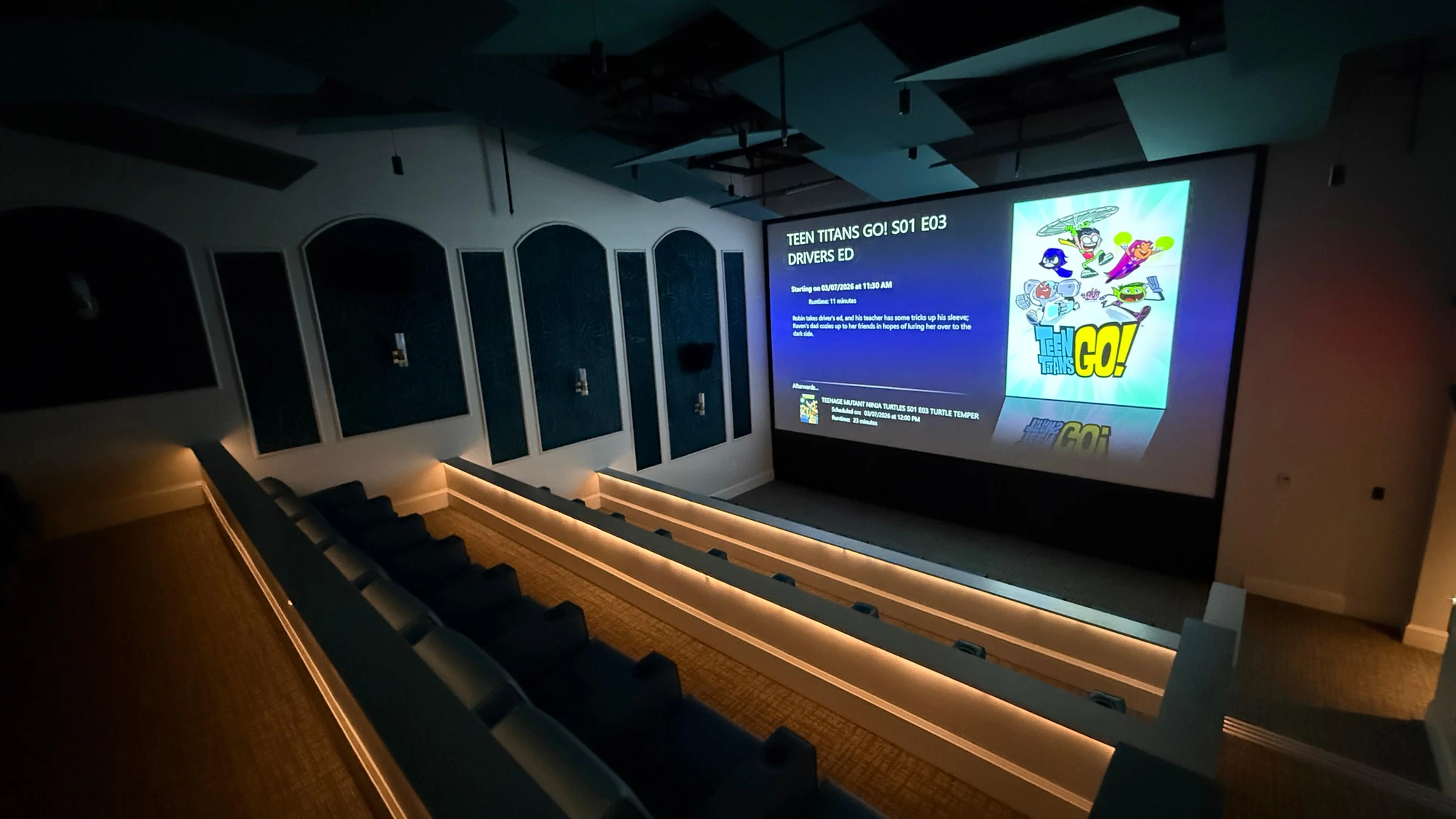 Beaches Turks & Caicos movie theater interior featuring large screen, surround sound, and comfortable seating, highlighting kid-friendly entertainment and family activities at the Caribbean resort.