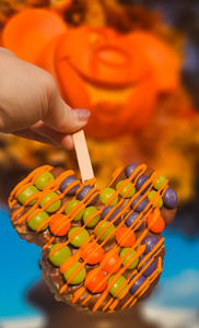Halloween-themed rice crispy treat with colorful candy garnish during Mickey’s Not-So-Scary Halloween Party at Magic Kingdom.