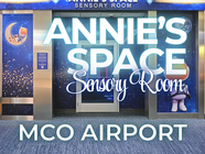 Entrance to Annie’s Space sensory room at Orlando International Airport MCO Terminal A, autism-friendly airport space supporting neurodiverse travelers, featured by Certified Autism Travel Professional Brandi Parker specializing in autism-friendly vacation planning.