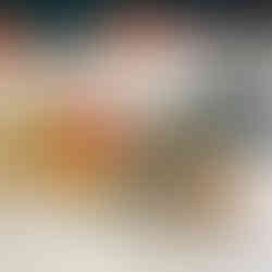 Charcuterie-style appetizer board with cured meats, cheeses, and small dipping sauces, representing artisanal dining options available on modern cruise ships.