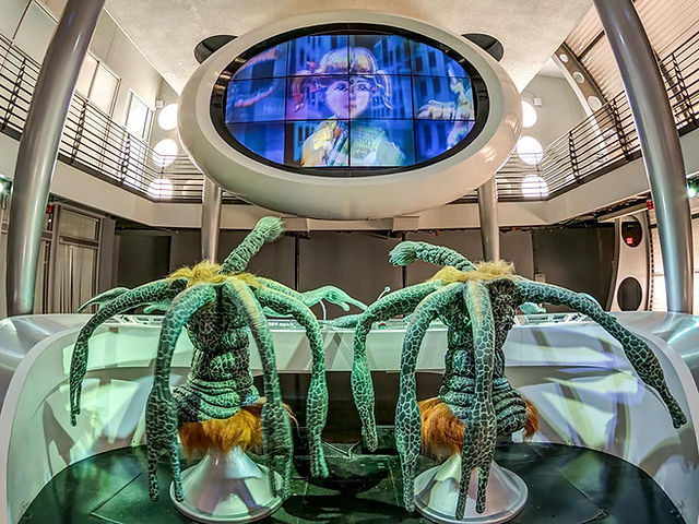 MEN IN BLACK Alien Attack ride entrance area at Universal Orlando during Halloween Horror Nights, featuring the attraction’s sci-fi theming and one of the rides available during the event.