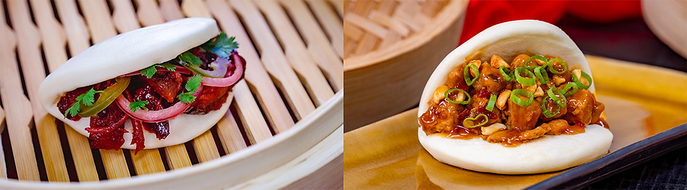 Steamed bao buns filled with savory braised meat and garnished with green onions, highlighting a popular Lunar New Year food offering available during the Disneyland Lunar New Year celebration at Disneyland Resort