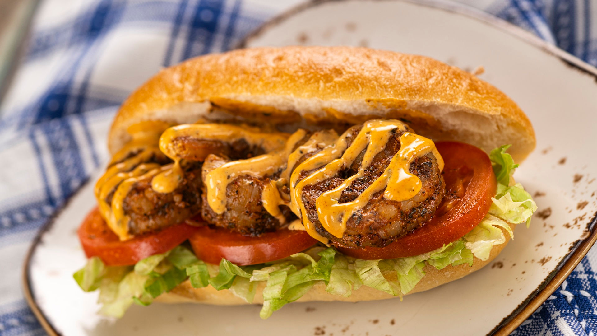 Grilled festival sandwich topped with sautéed mushrooms and sauce at EPCOT Flower & Garden Festival, highlighting creative Disney World Outdoor Kitchen menu items and popular savory snacks for eating around the world.