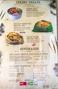 Close-up of Halloween Horror Nights menu showcasing themed dishes and specialty drinks available throughout the event.