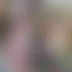 A woman processing a deer carcass, people nearby. USING THE WHOLE ANIMAL. This is a deer skin tanning course.