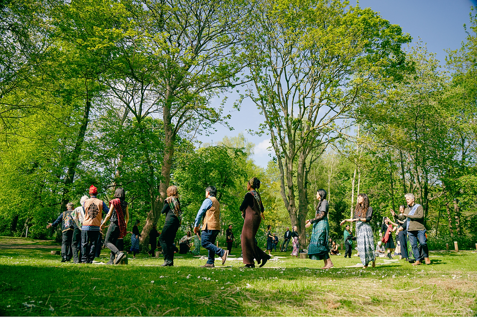 The woodland Liling - Eileen in the centre, wearing a headscarf. (📷: FOE)