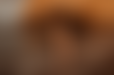 A woman in made to measure lingerie posing in the serene waters, conveying a feeling of freedom and self love.  