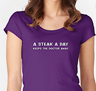 The 'A Steak A Day Keeps The Doctor Away' graphic is available on t-shirts, accessories, home decor and more. 