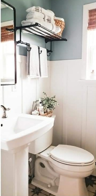 Hotel towel shelf in bathroom. 