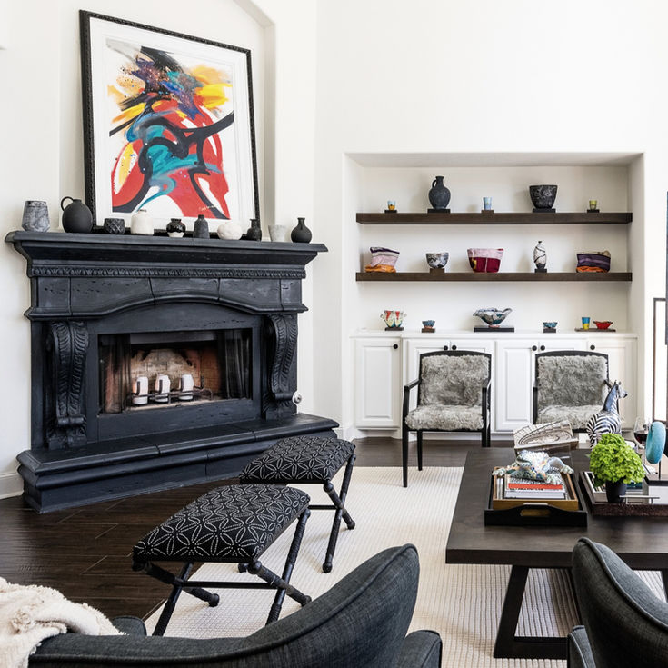 Living room with a black fireplace