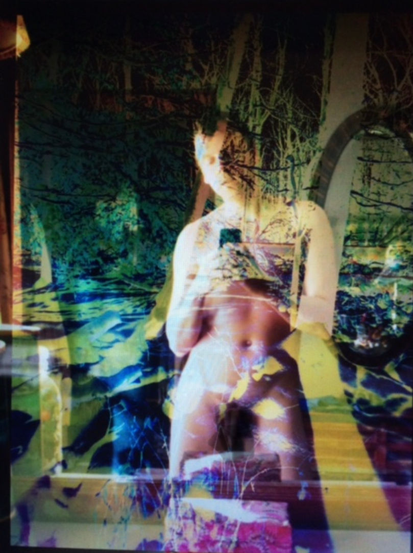 Eye-level view of a person posing confidently in natural light, highlighting the curves and lines of the body