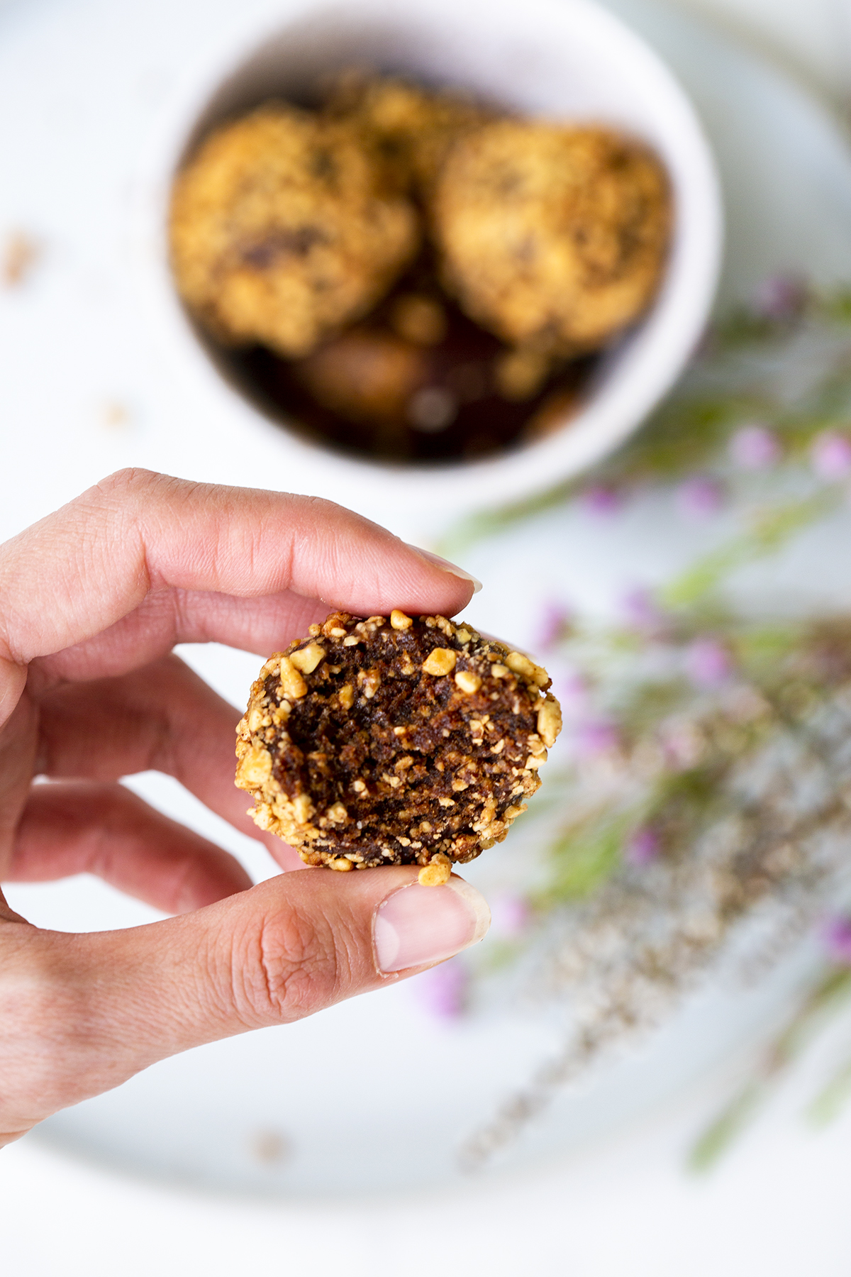 Kitchen Remedy Snickers Protein Ball, a dense raw chocolate snack suitable for counter and cabinet display
