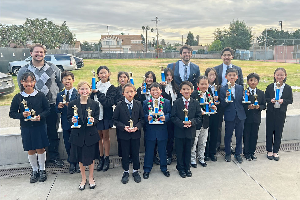 Our Elementary Team students with Coach Adam, Coach Tom, and Coach Gabriel