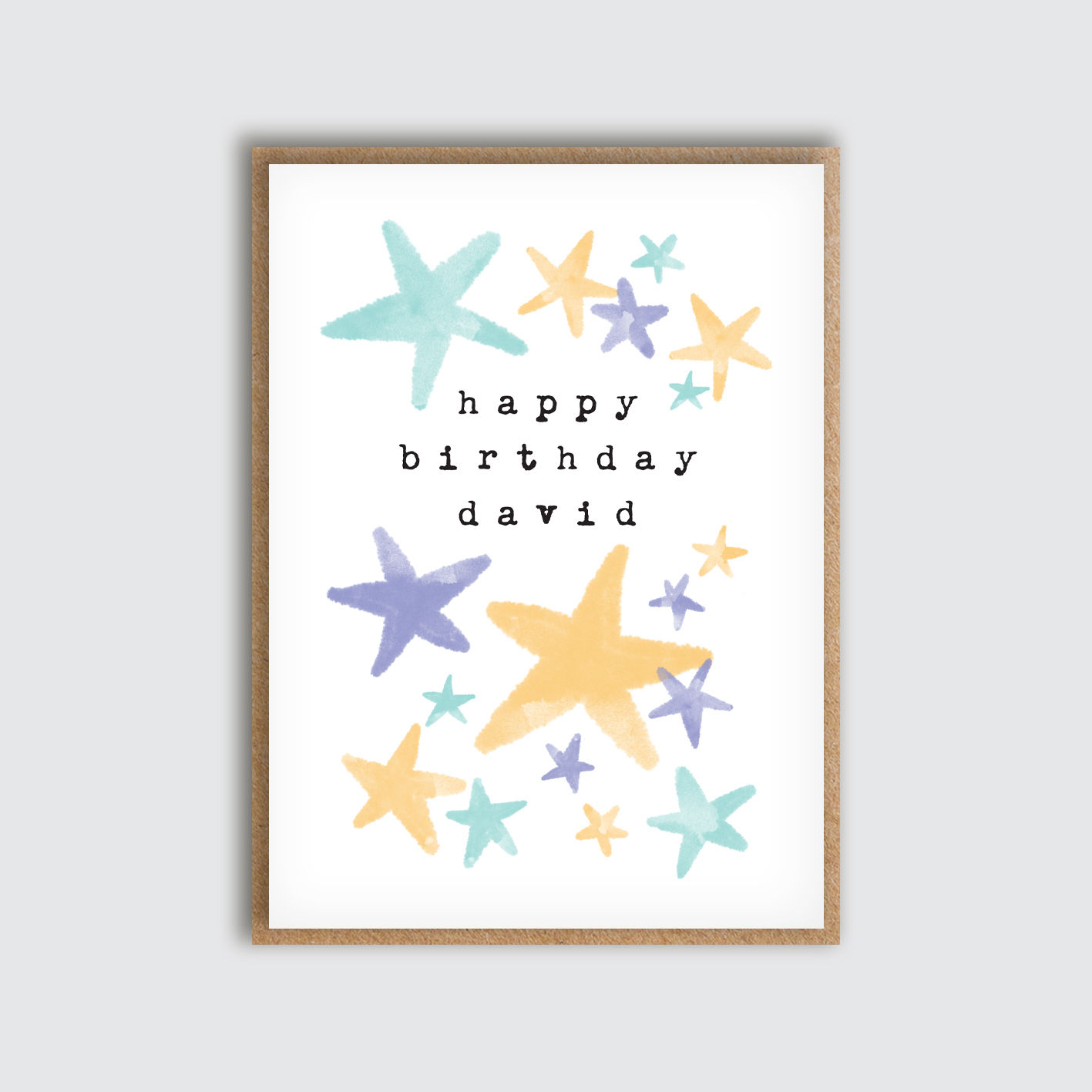 Personalised Inked Big Stars Birthday Card. Front view of card. Scattered blue, yellow and purple stars.
