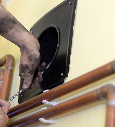 Nettoyage d'un conduit de chaudière