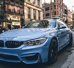 blue BMW coupe parked on the road during daytime_edited.jpg
