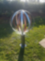 painted double sphere on square stand 1.2 metres high