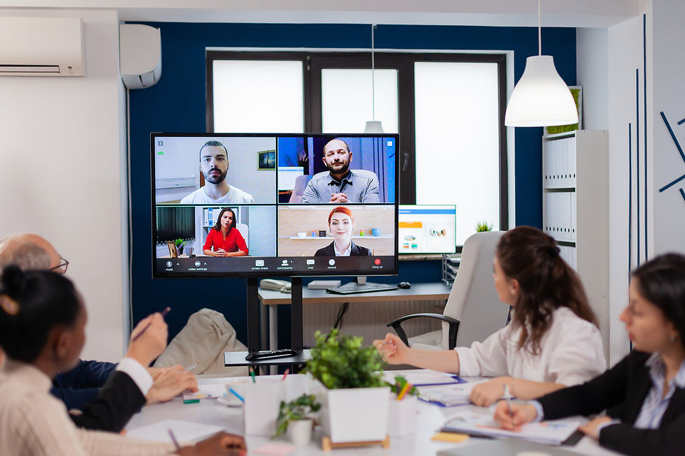 “Hybrid work culture with employees collaborating through a video call from home and office.”