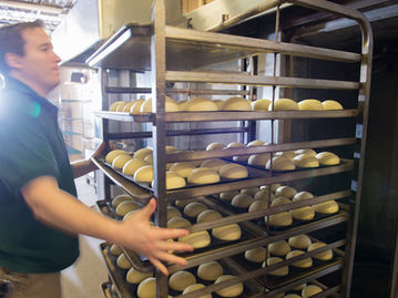 22 Mancini's Rolls Going into the Oven.jpeg
