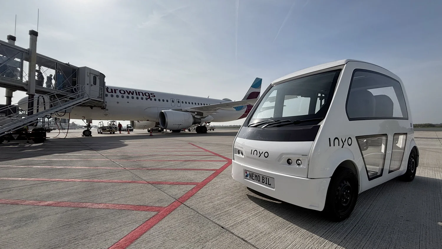 Inyo CAB in front of an Airplane at Paderborn Airport