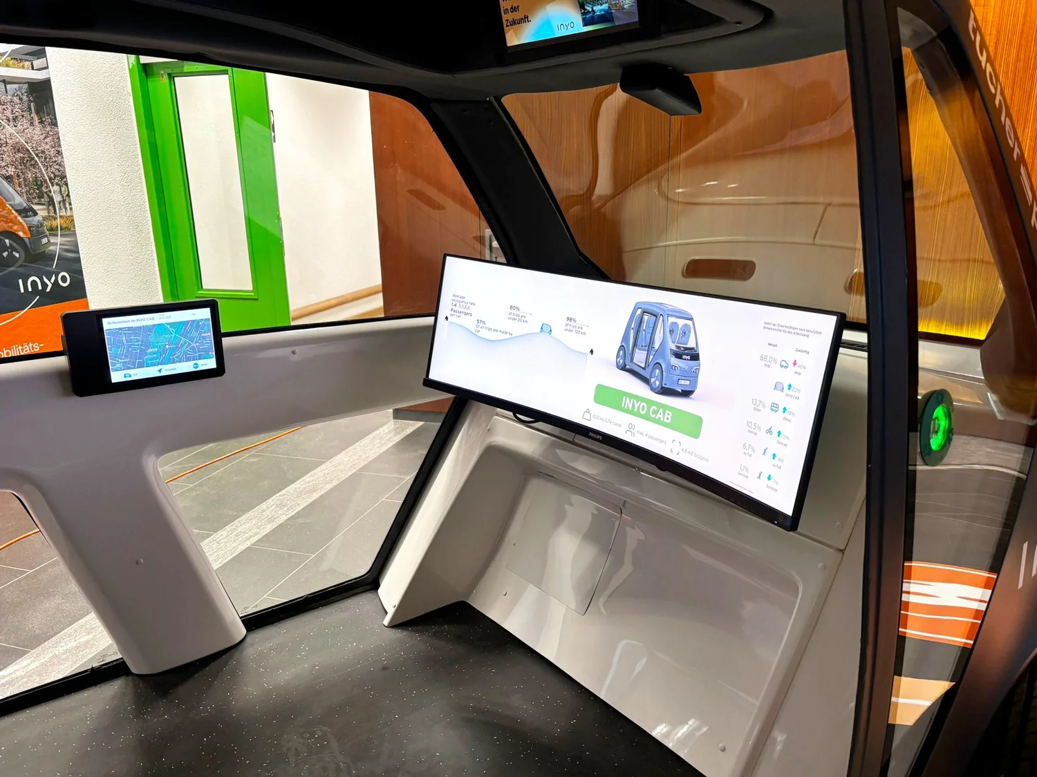 Interior view of the INYO CAB showcasing the new infotainment system and digital vehicle platform fe