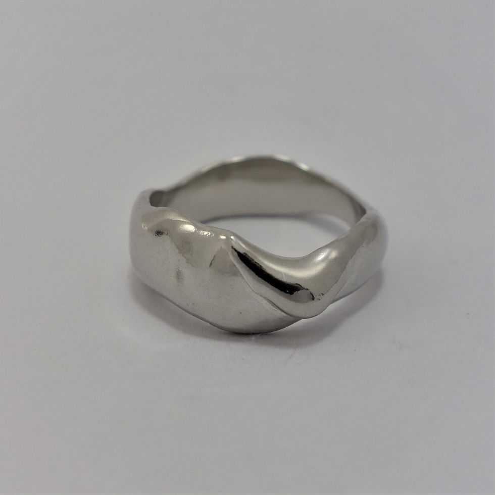 Thumbnail: Sterling silver ring with a softly irregular, organic shape.
