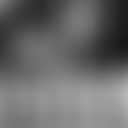 Business man playing a game of chess in a suit