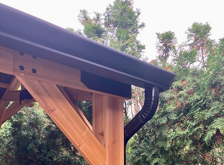 Black color gutters installed