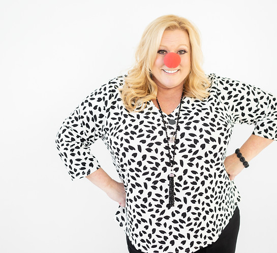 Julie Burch with a clown nose for stress management