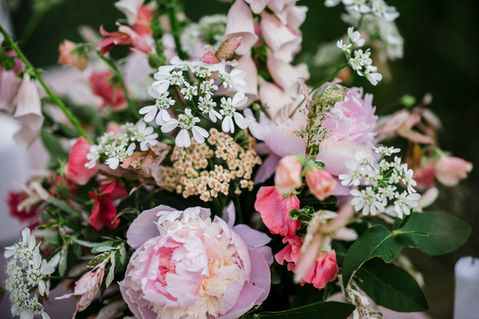 Vermont wedding centerpiece arrangement with pink peonies, orlaya, foxglove, and sweet peas