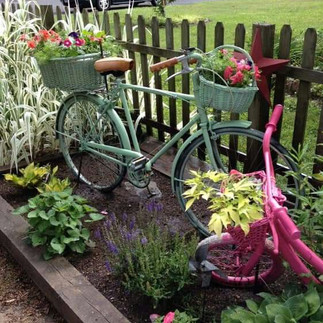 The magic of vintage items in summer gardens and porches.