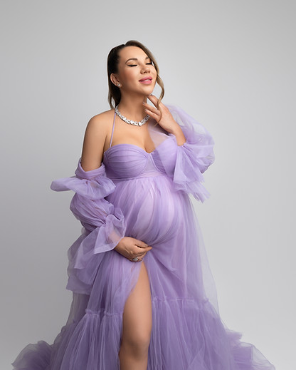 Close up maternity photography in London studio showing baby bump