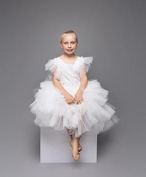 Smiling child during portfolio update photoshoot in London studio