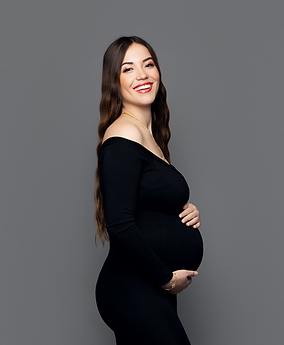 Maternity photoshoot in London studio with soft neutral tones