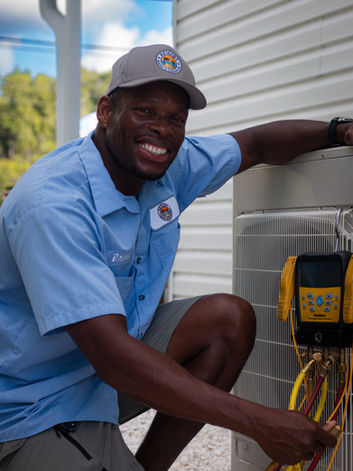 Technician inspecting AC unit