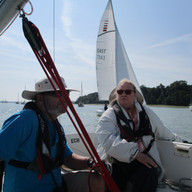 Tanya Maggs about to take the helm of Echo on the way to Woolverstone