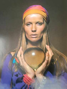 Supermodel Veruschka with crystal ball for McCall's magazine shoot, 1972. Photo by Don Snyder, All Rights Reserved