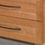 Thumbnail: Closeup of cabinet drawer in S2 Almond Maple Shaker