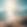 a close up image of the sand overlooking a clear blue sea, sun beaming down, with softer t