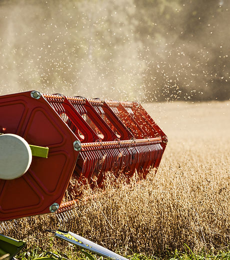 Combine Harvester on Field