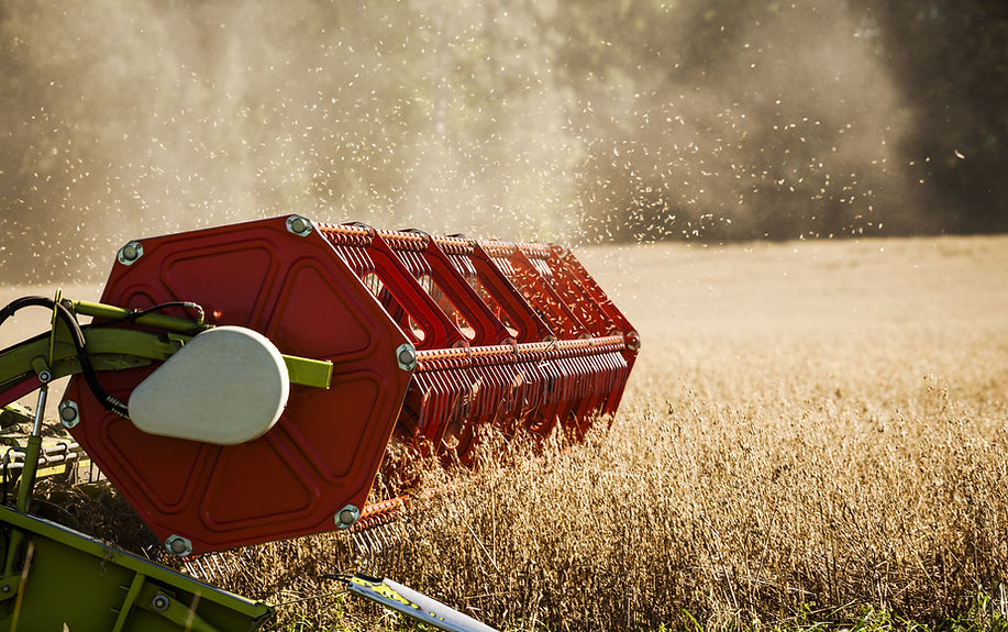 Combine Harvester on Field