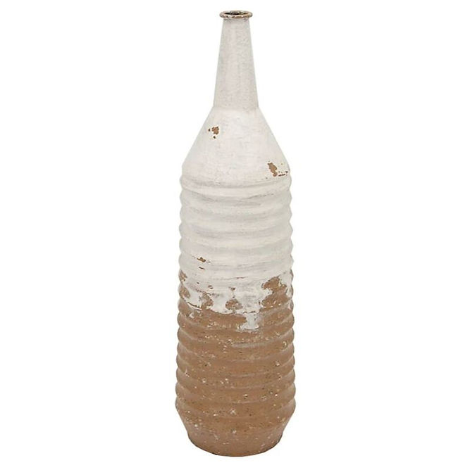 white tan metal vase athome