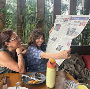 Gaby with Newspaper.jpeg