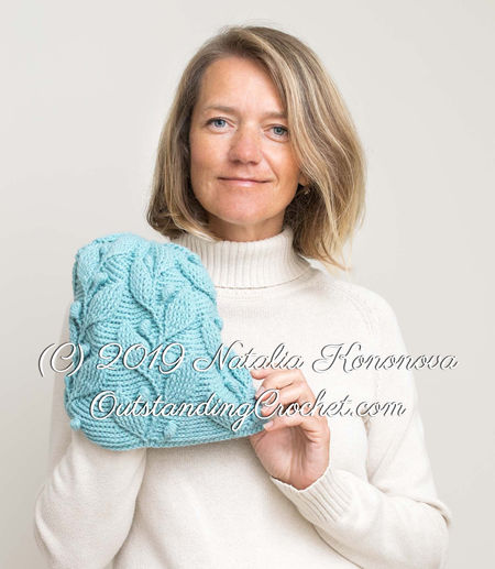 Crochet pattern on embossed crochet technique, textured hat with 3D ivy leaves and berries.