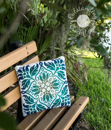 Petalique Pillows mosaic crochet pattern: smaller without a border and larger with a border. Made from the center without any tails to hide.  Features delicate flowers and leaves on the front with a plain back. Can be made as a wall hanging.