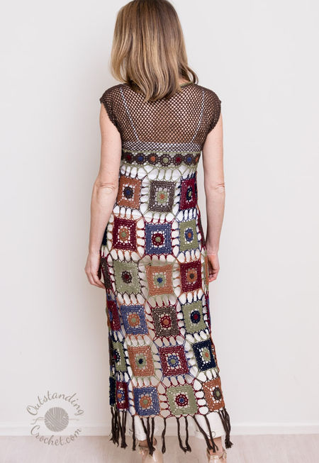 Multicolored Long Vest lace crochet pattern made with granny squares, open front, V-neck, and fringed hem.