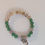 Thumbnail: Green and white bead bracelet
