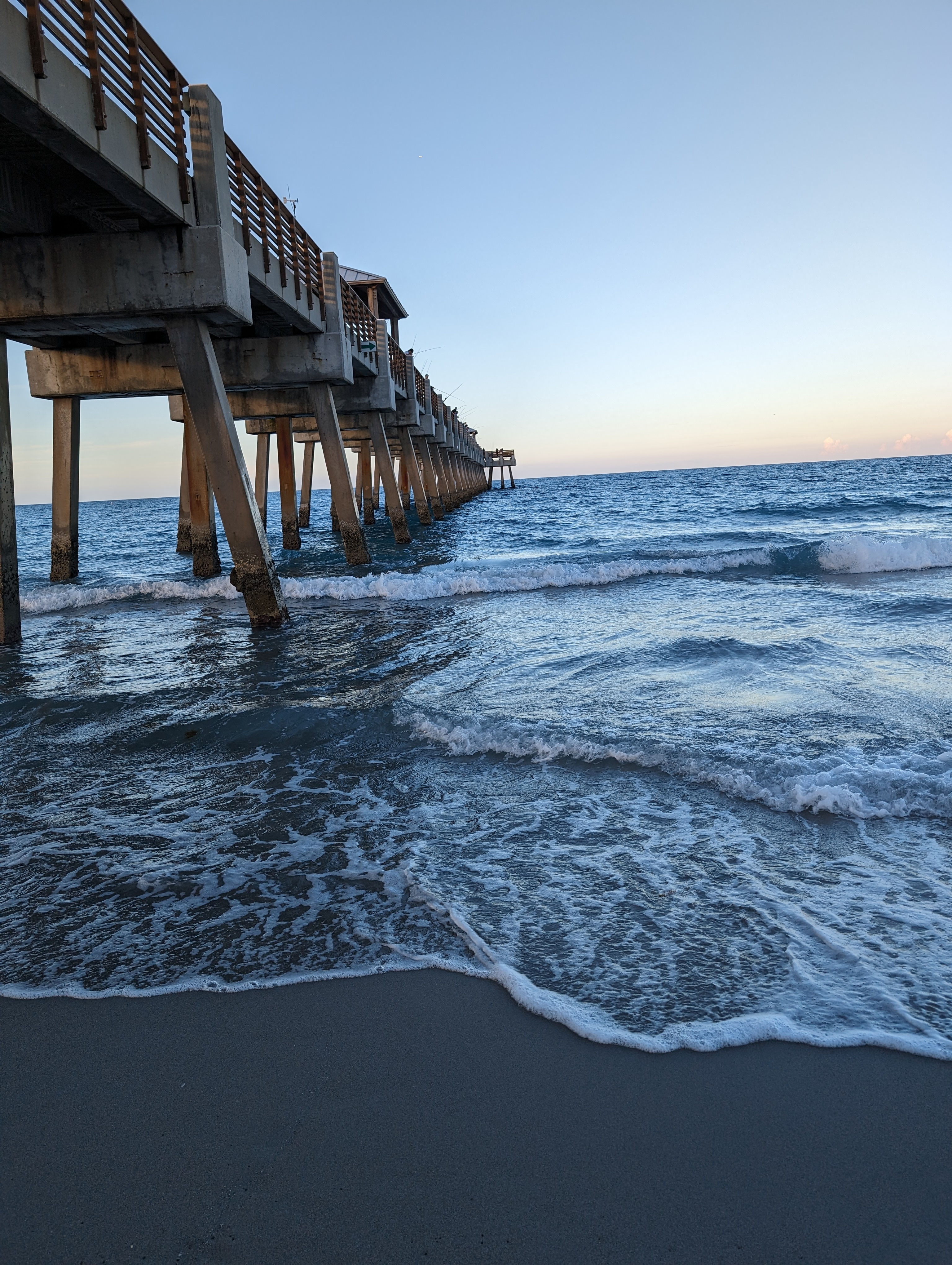 under the pier at the beach 