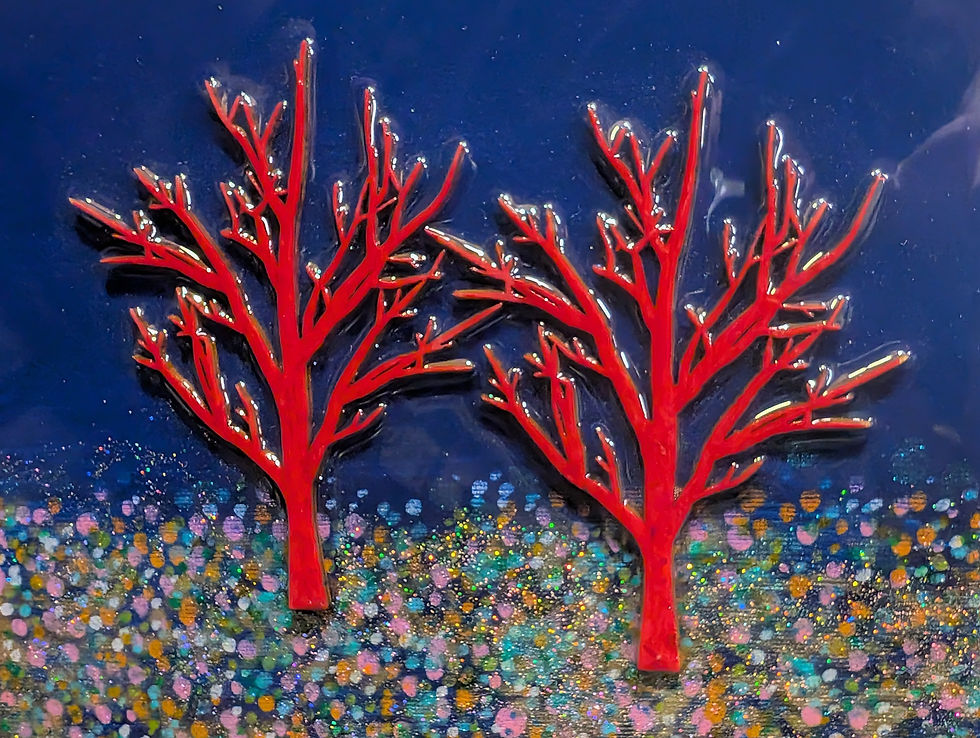 Two red trees on blue background