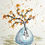 Thumbnail: orange flowers in blue vase